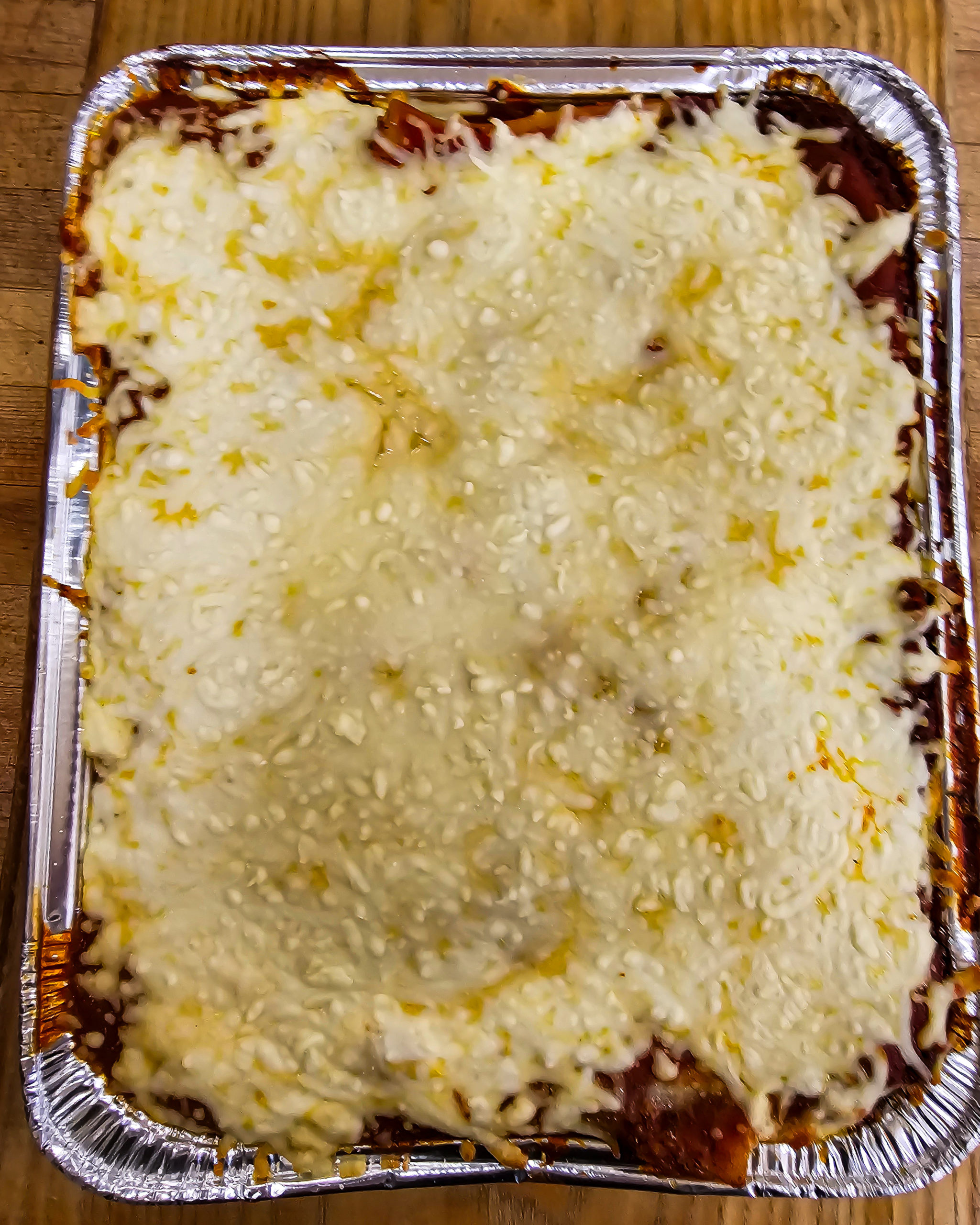 Entree Lasagna Pan (lean ground beef, mozzarella, tomato sauce, spices) serves 9-12