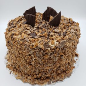 Skor Cake (chocolate cake, Skor toffee almond mousse filling & icing, crushed Skor bars)